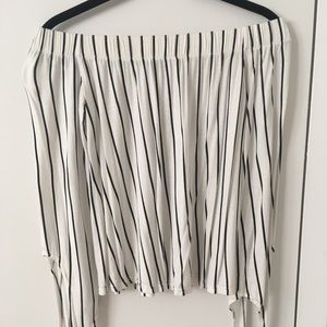 Slightly worn striped blouse.